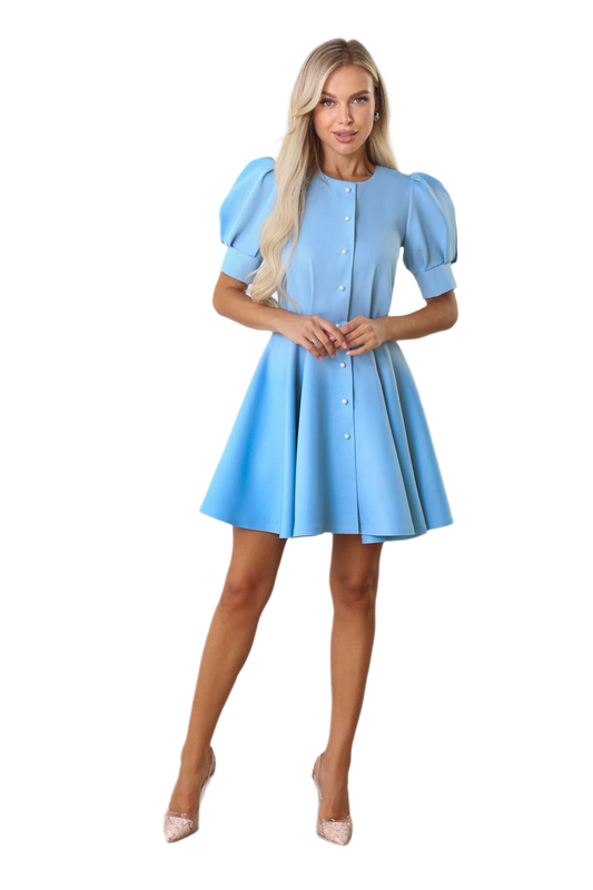 Woman wearing a light blue dress on a white background