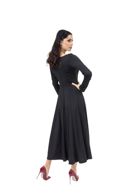 Woman wearing a black dress on a white background