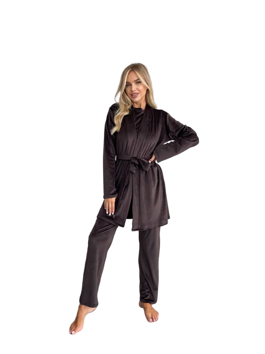 Woman wearing a dark brown outfit on a white background