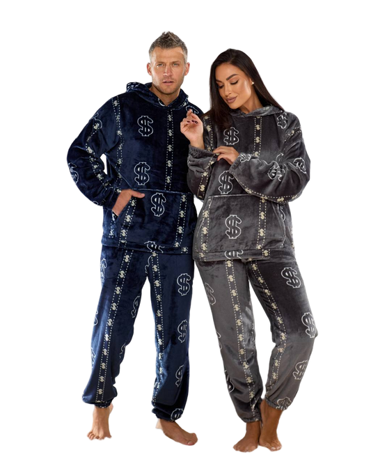 Two people wearing matching pajama sets with a pattern on a white background