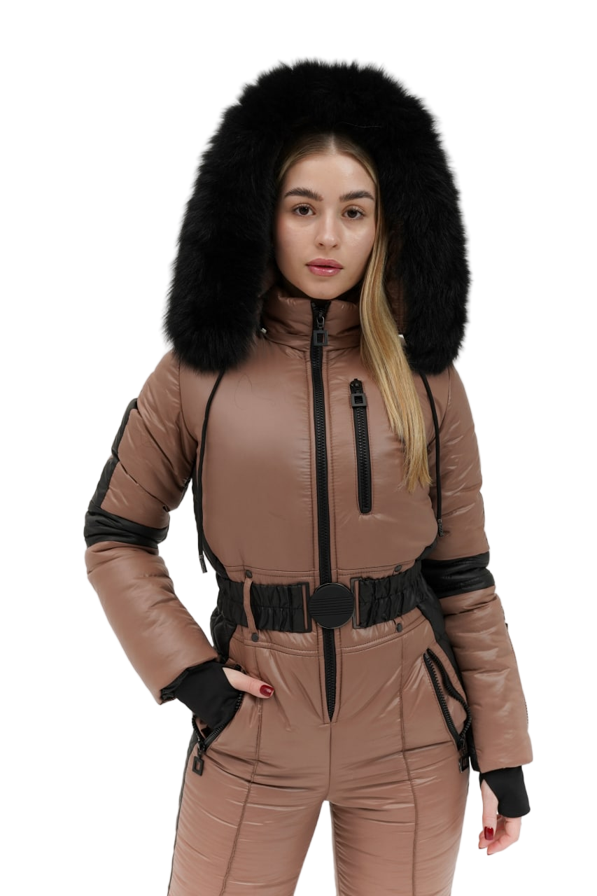 Woman wearing a brown snowsuit with a black fur hood on a white background