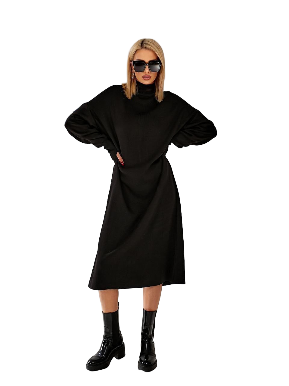 Woman wearing a black dress with a white background