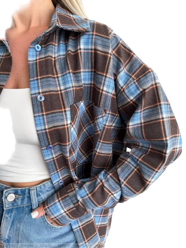Plaid shirt worn by a person on a white background