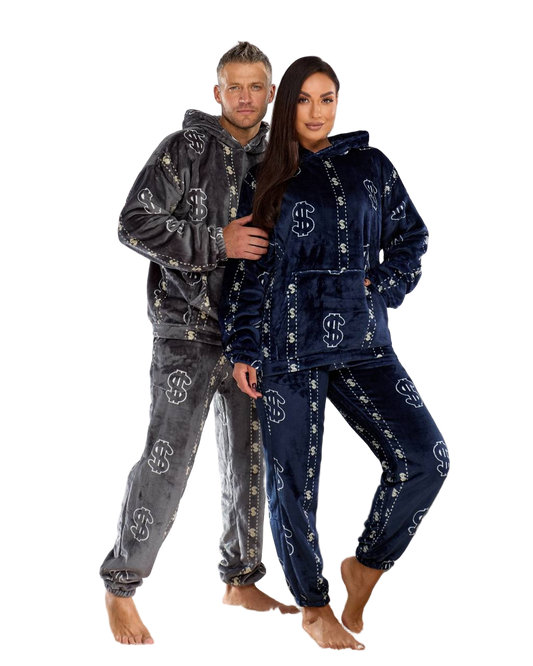 Two people wearing matching pajama sets with a logo on a white background
