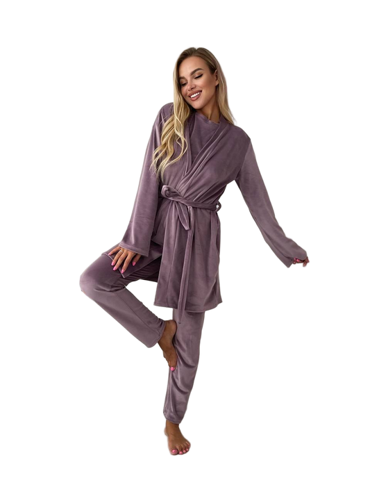 Woman wearing a purple robe on a white background