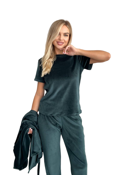 Woman wearing a dark green outfit on a white background