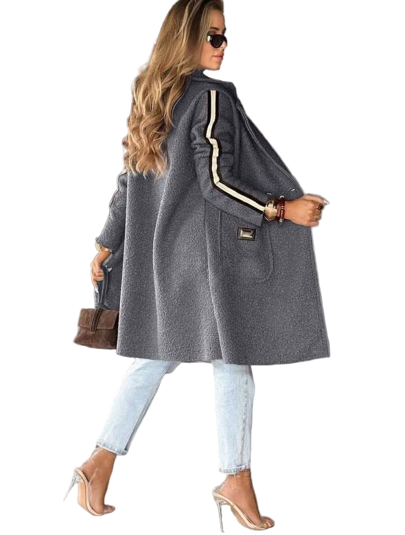 Woman wearing a gray coat with white trim on a white background