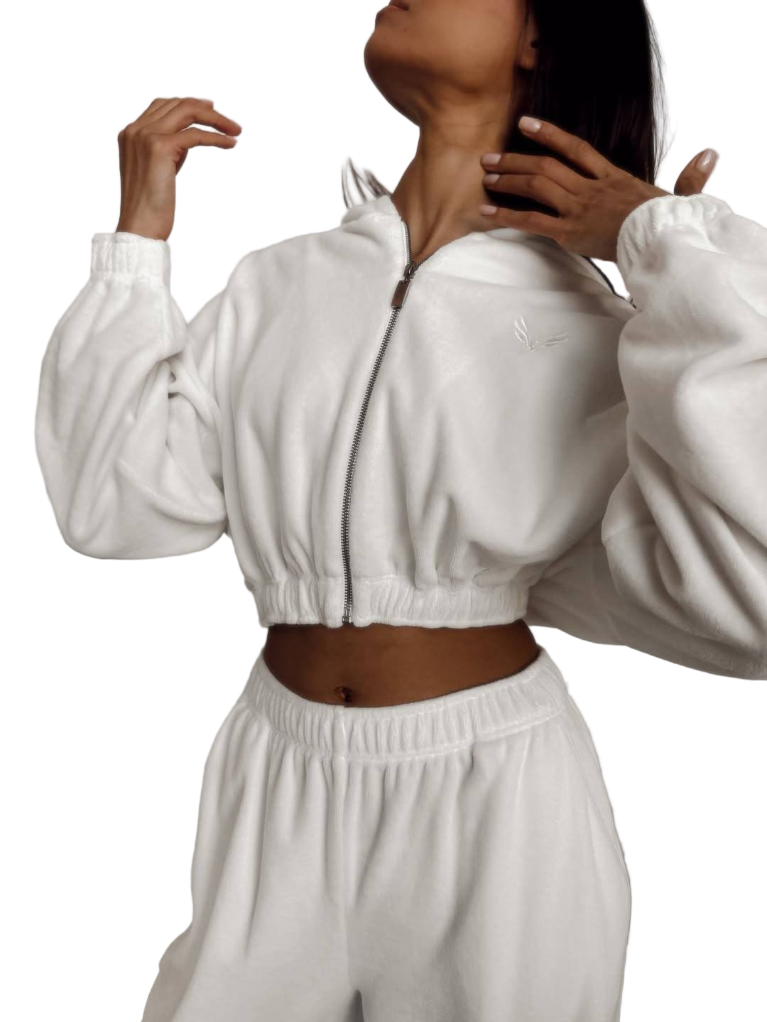 Person wearing a white tracksuit on a white background