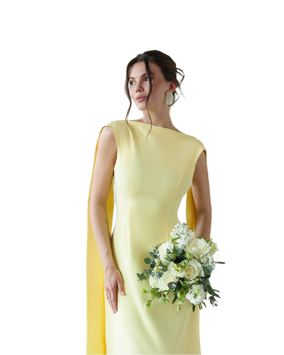 Woman in a yellow dress holding a bouquet of flowers on a white background
