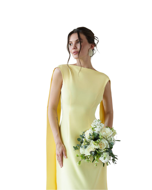 Woman in a yellow dress holding a bouquet of flowers on a white background