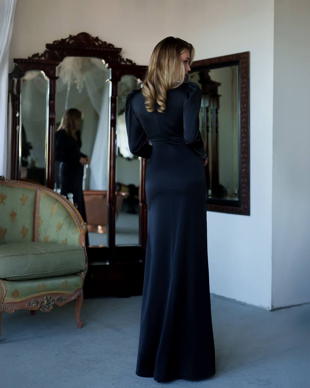 Elegant Black Maxi Dress with Long Sleeves and Front Slit