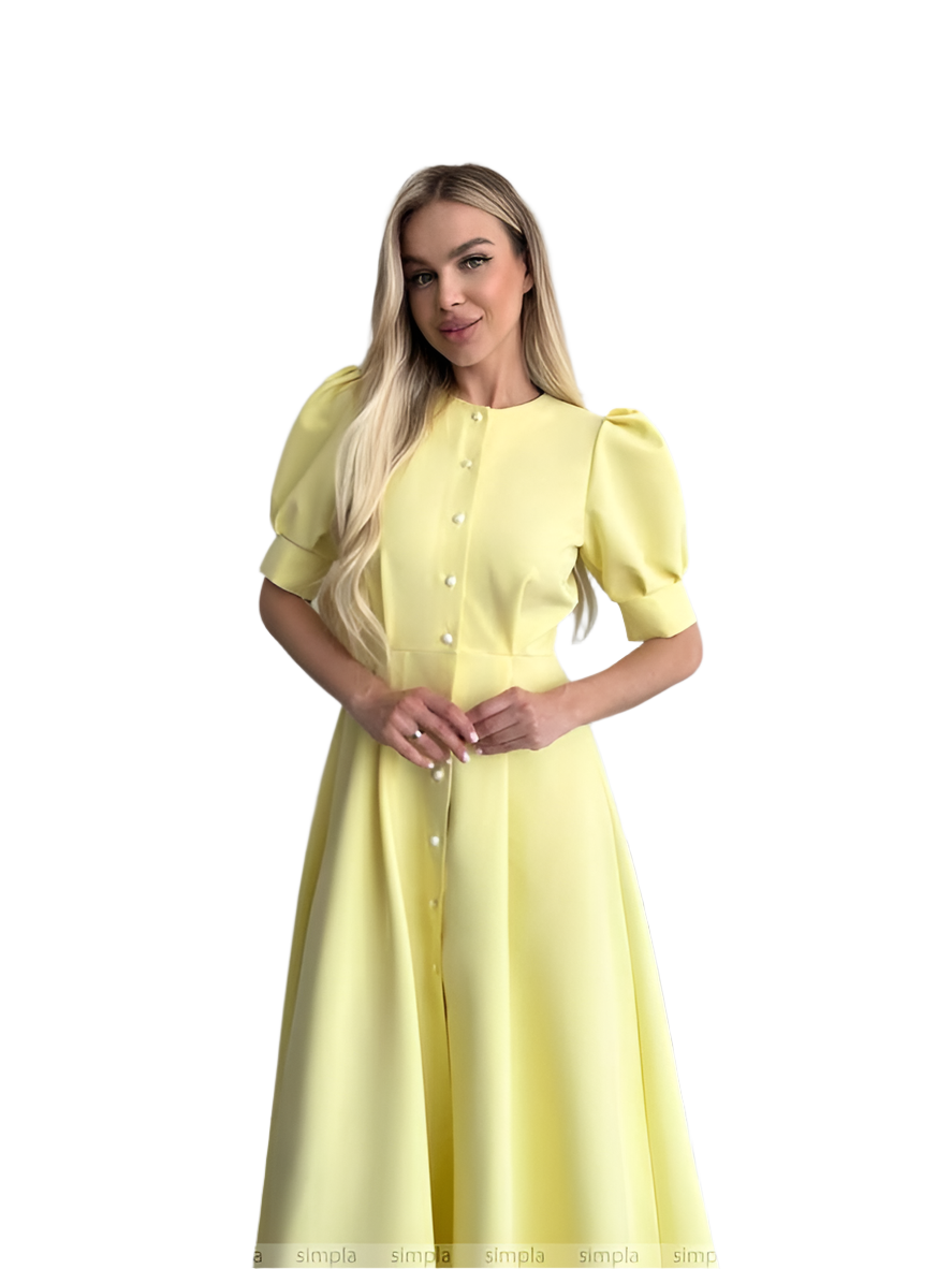 Woman wearing a yellow dress on a white background