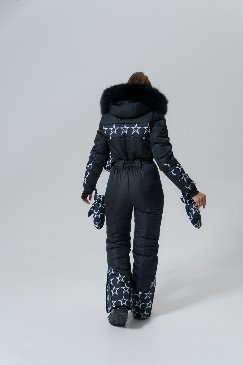 Black snowsuit with star patterns on a white background