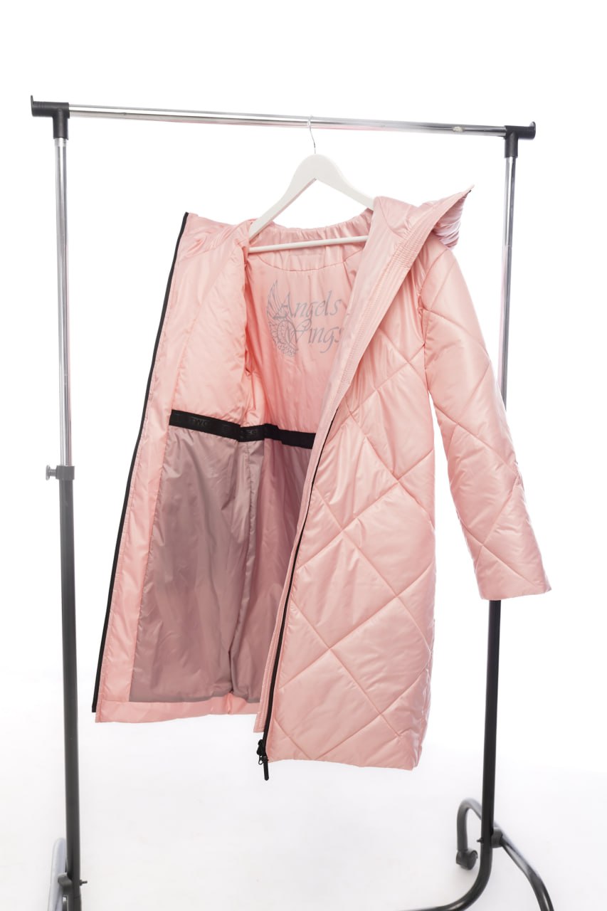 Pink quilted jacket on a hanger against a white background
