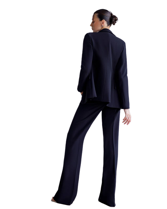 Person wearing a navy blue suit on a white background