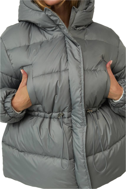 Gray puffer jacket worn by a person on a white background