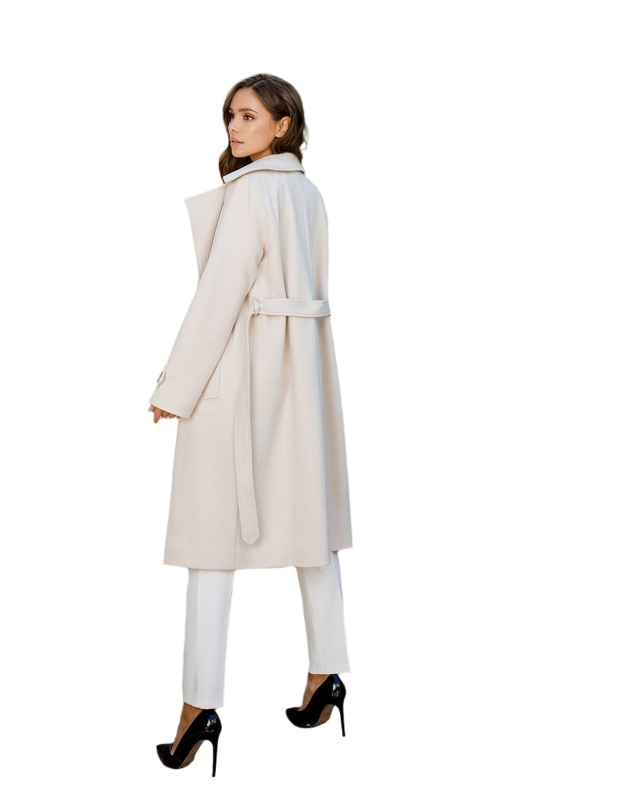 Woman wearing a long beige coat on a white background