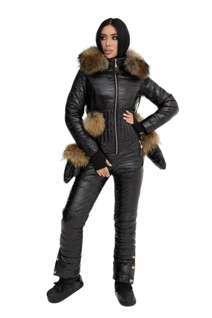 Person wearing a black snowsuit with fur trim on a white background