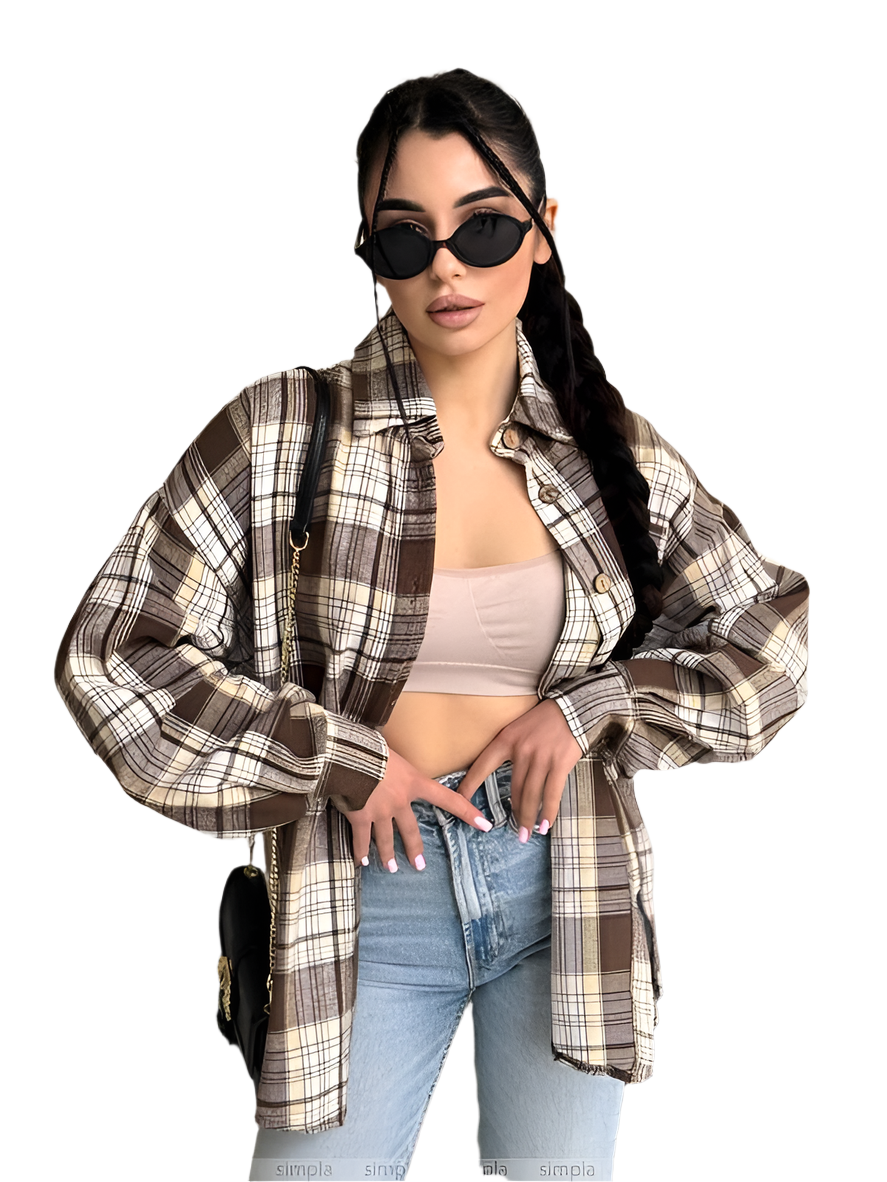 Woman wearing a plaid shirt, sunglasses, and jeans on a white background