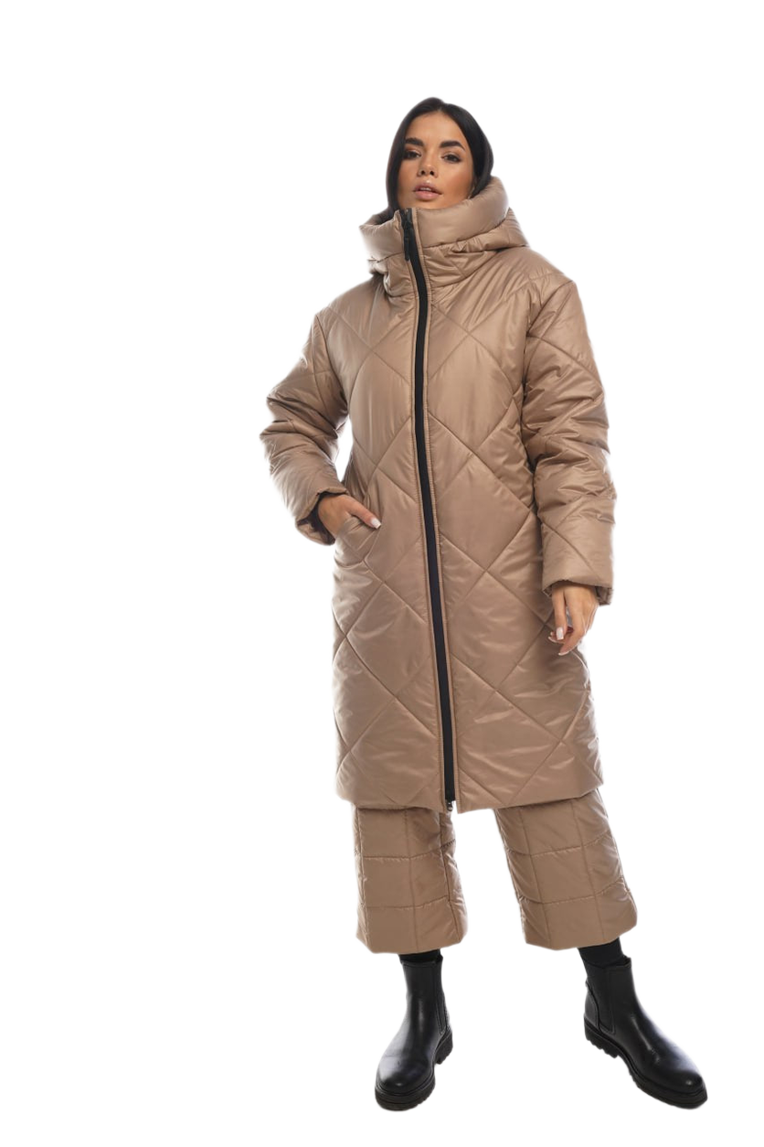 Woman wearing a beige quilted coat on a white background