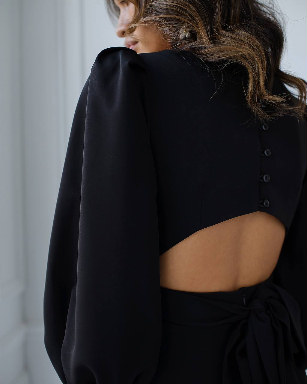 Elegant Midi Dress with Puff Sleeves and Cutout Back in Black