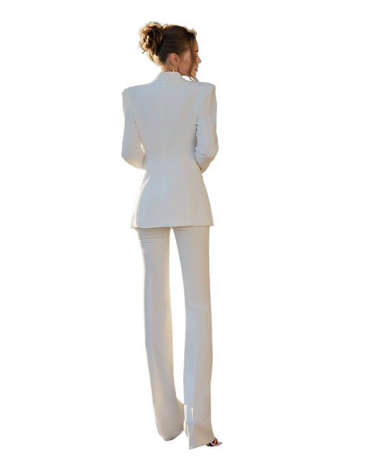 Woman wearing a white suit on a white background