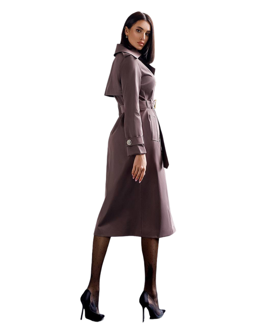 Woman wearing a long brown coat on a white background