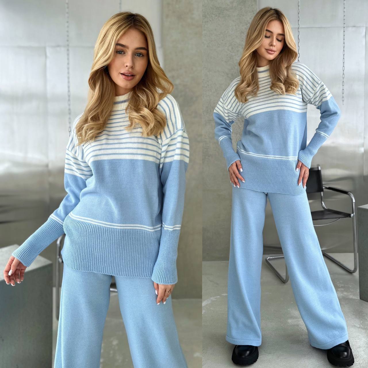 Woman wearing a blue and white striped sweater and pants in an indoor setting.