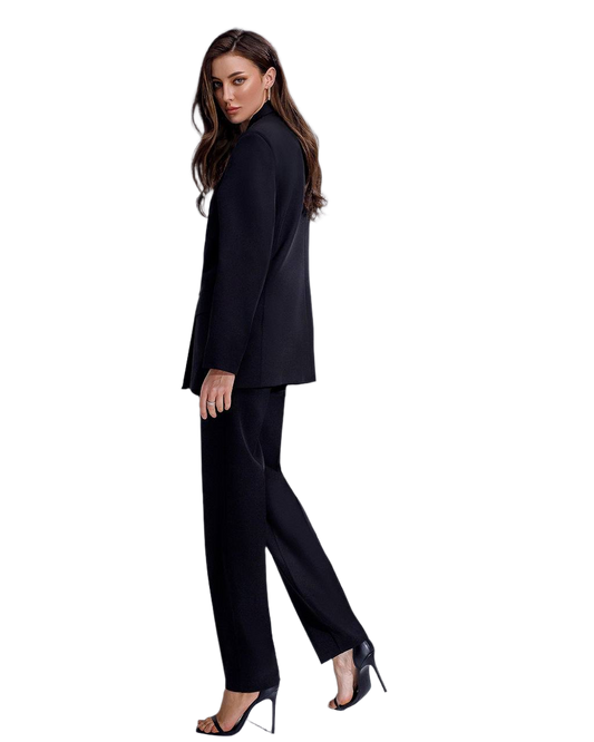 Woman wearing a black suit on a white background