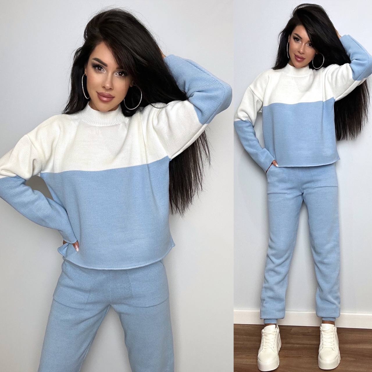 Woman wearing a blue and white color-blocked outfit with matching pants and sweater.