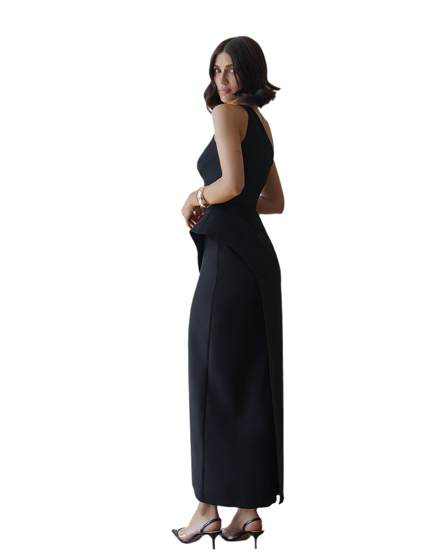 Woman wearing a black sleeveless dress on a white background
