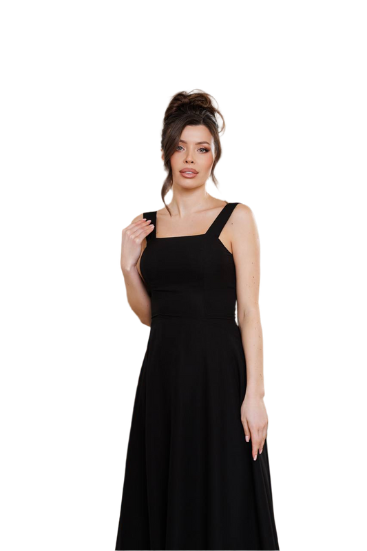 Woman wearing a black sleeveless dress on a white background