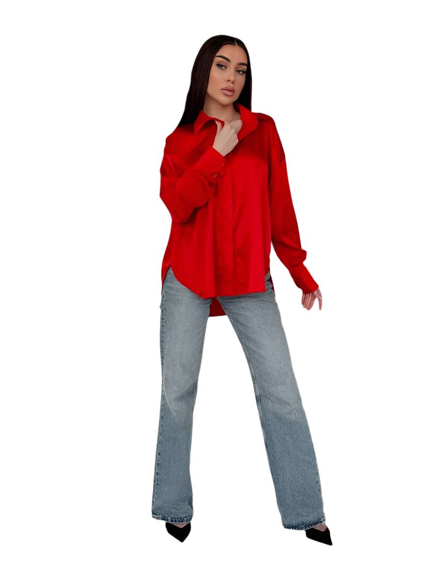 Woman wearing a red blouse and blue jeans on a white background