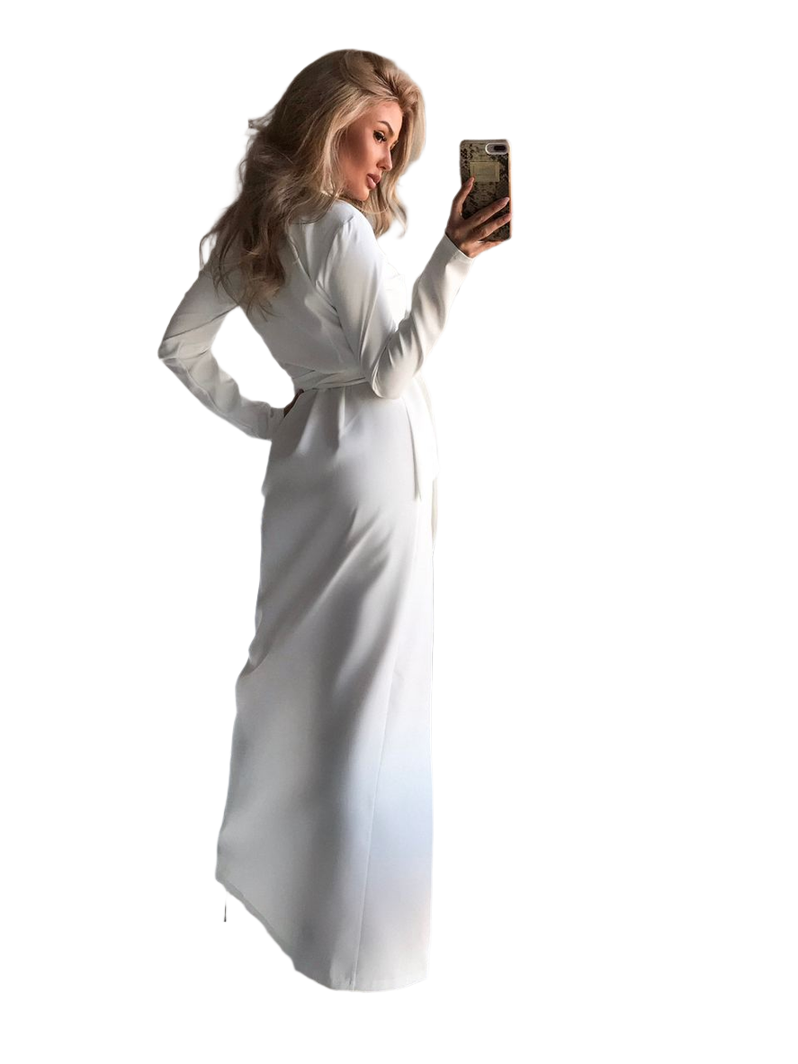 Woman in a white dress taking a selfie on a white background