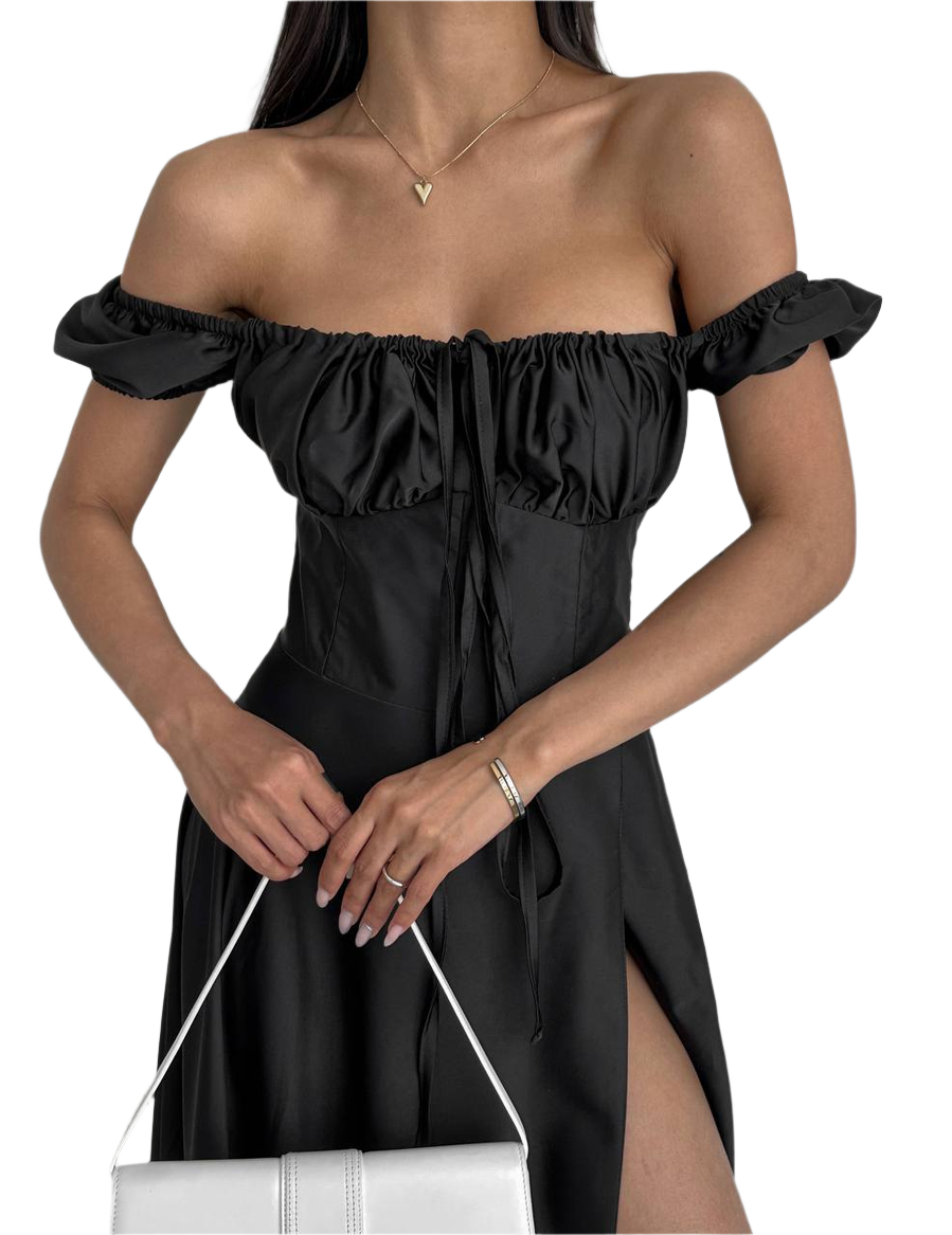 Black off-shoulder dress worn by a model on a white background
