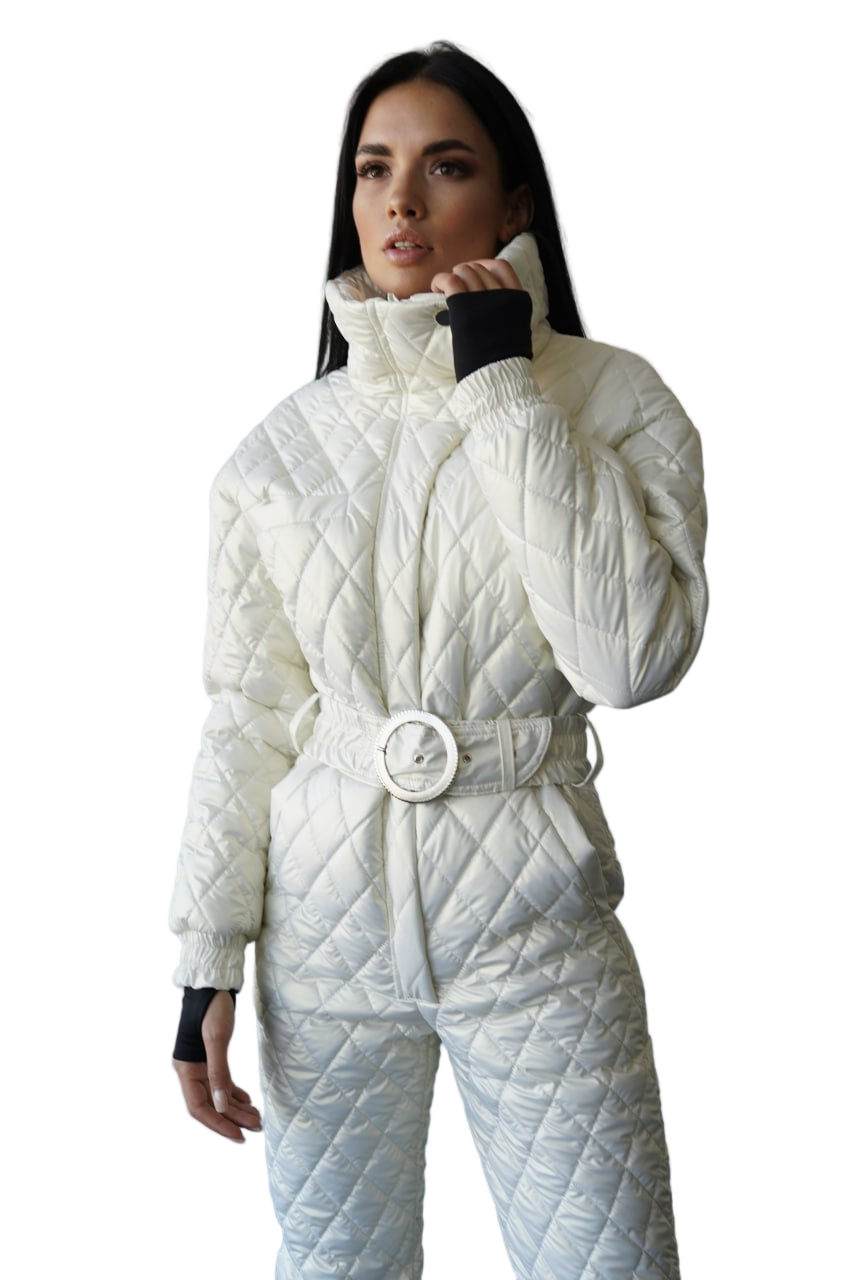 Woman wearing a white quilted snowsuit on a white background