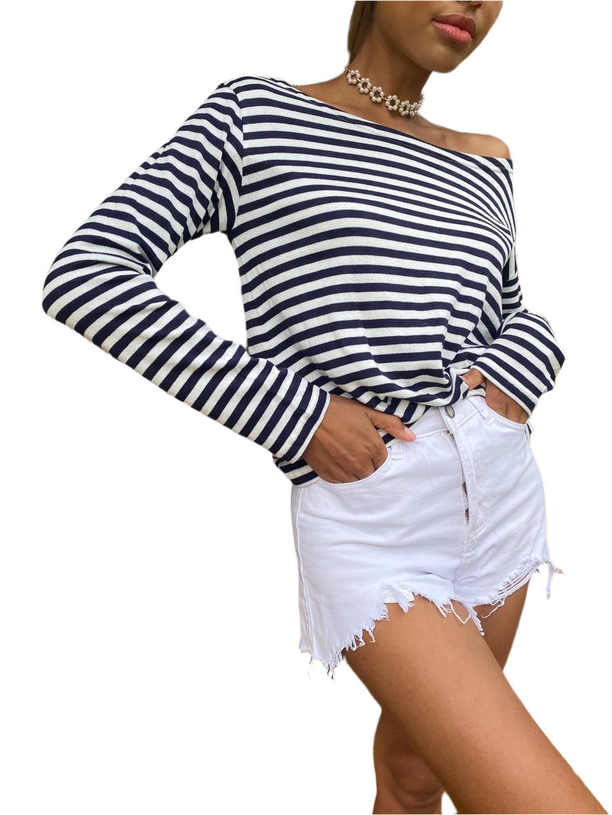 Woman wearing a black and white striped long-sleeve top with a white background