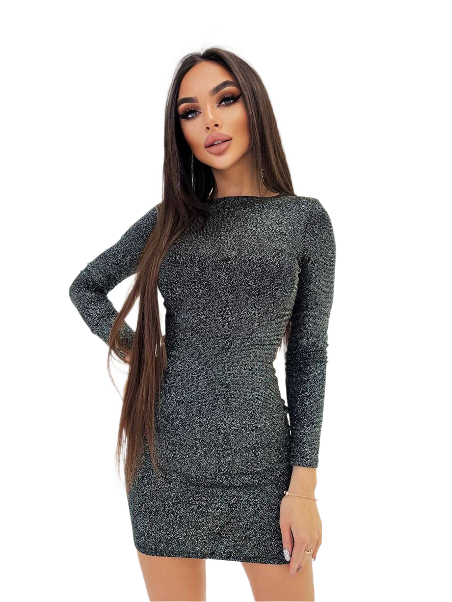 Woman wearing a sparkly black dress on a white background
