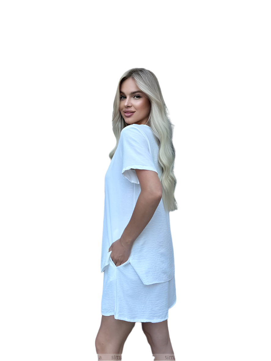 Woman wearing a light blue dress on a white background