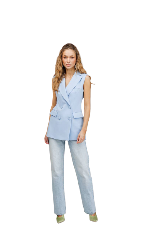 Woman wearing a light blue sleeveless blazer and pants on a white background