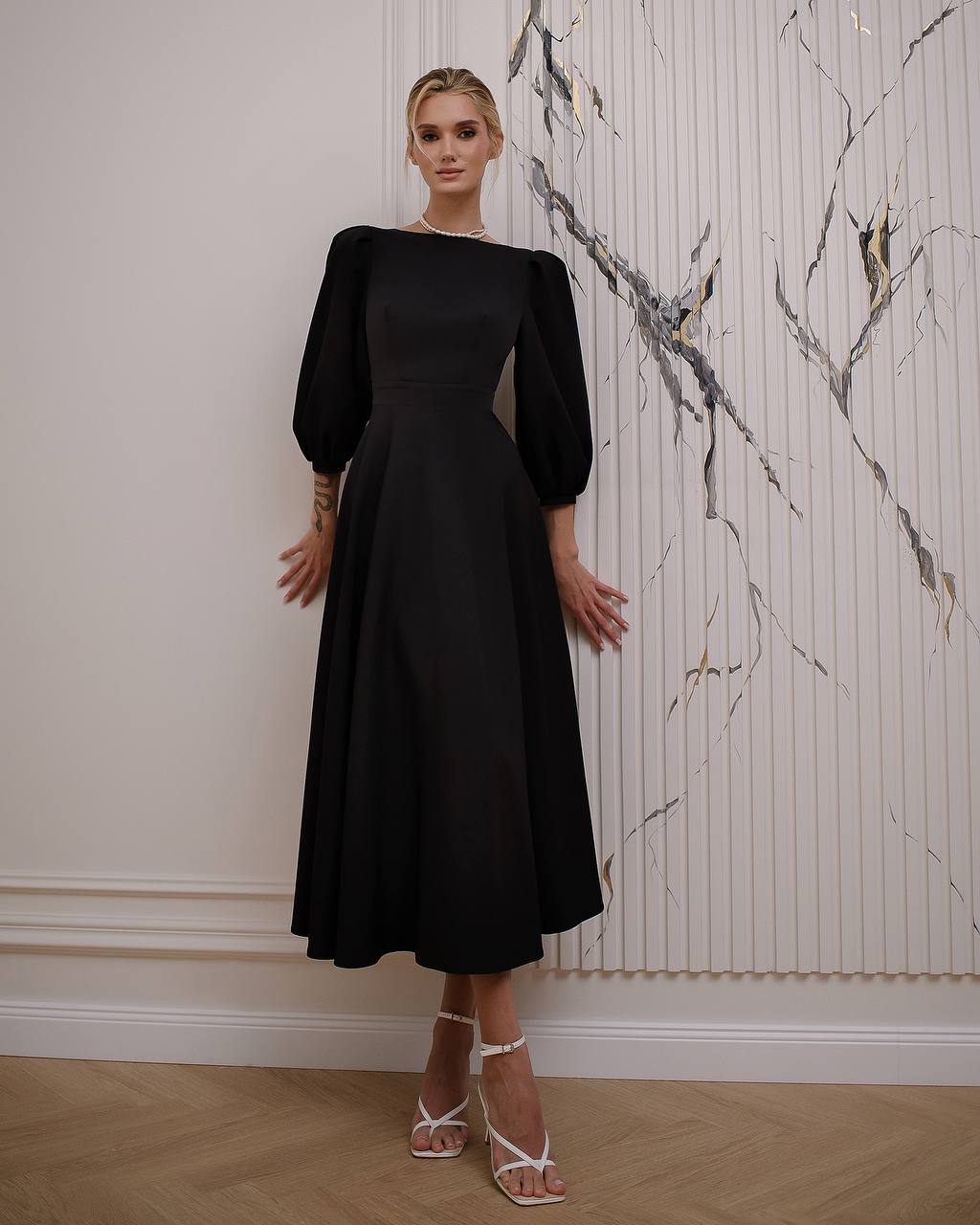 Elegant Midi Dress with Puff Sleeves and Cutout Back in Black