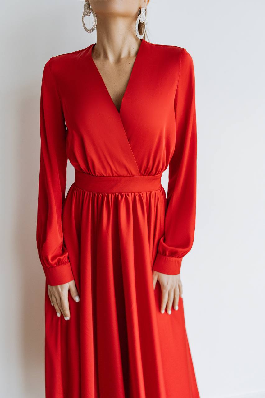 Red dress with long sleeves on a white background