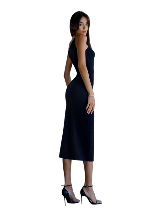 Woman wearing a black dress on a white background