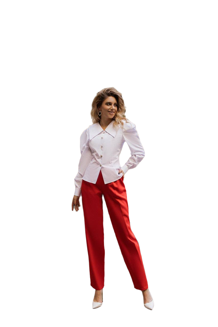 Woman wearing a white blazer and red pants on a white background