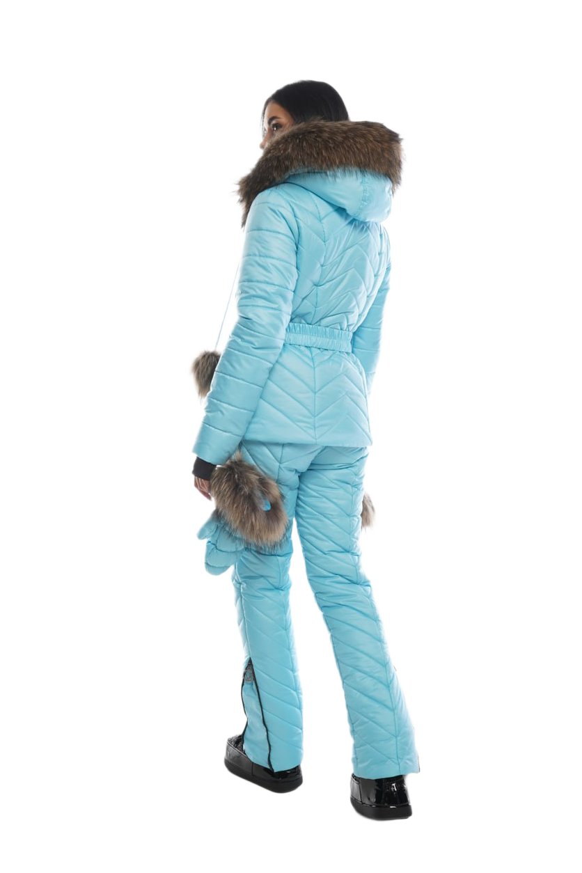 Person wearing a light blue winter suit with fur trim on a white background