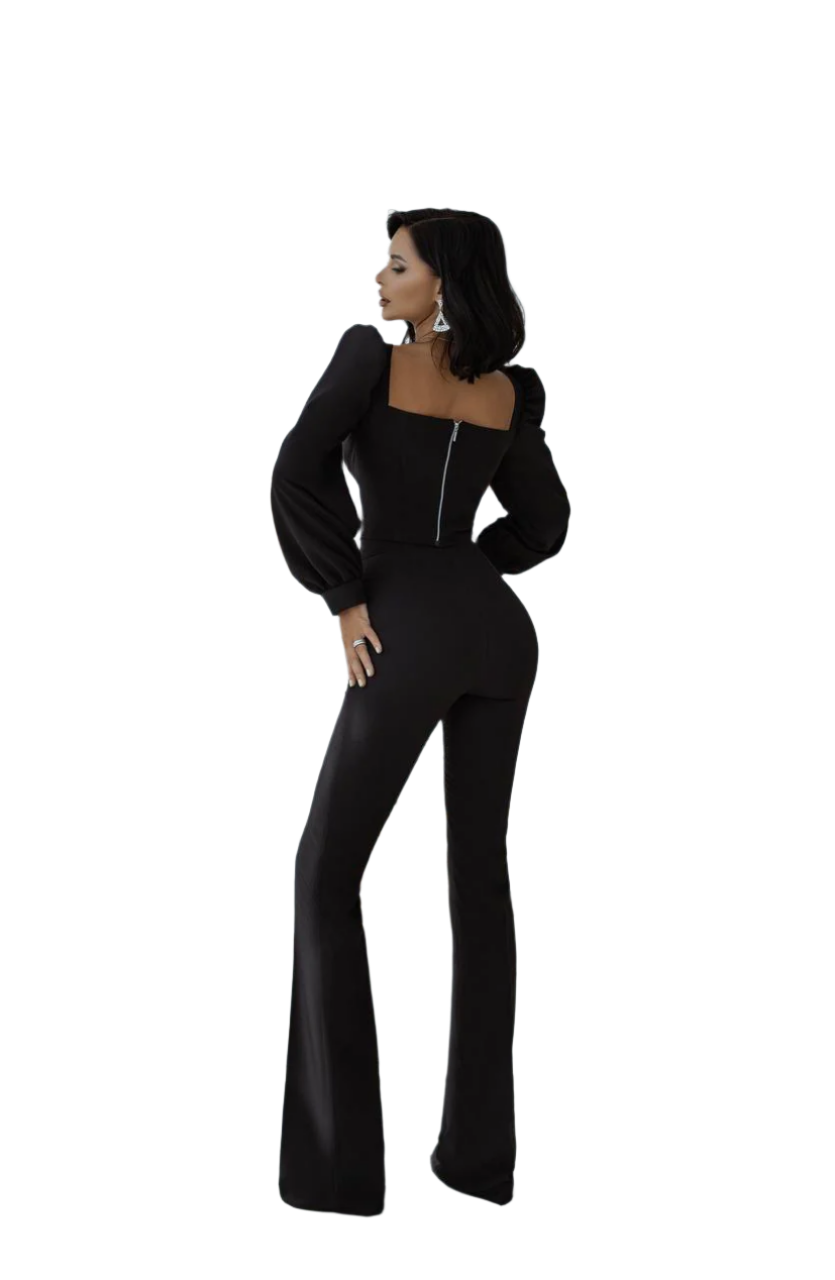 Woman wearing a black jumpsuit on a white background
