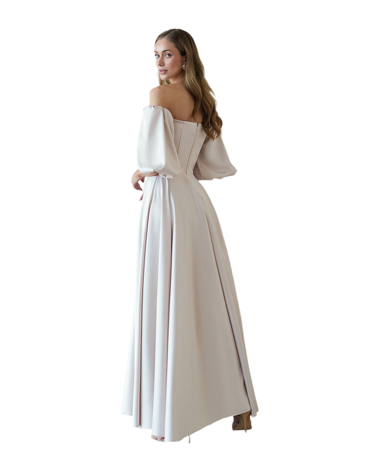 Woman wearing a white off-shoulder gown on a white background