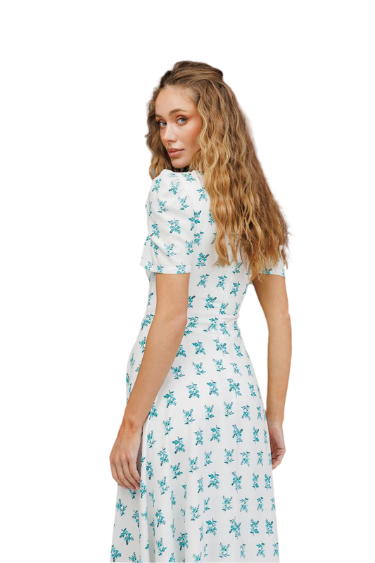 Woman wearing a floral dress on a white background