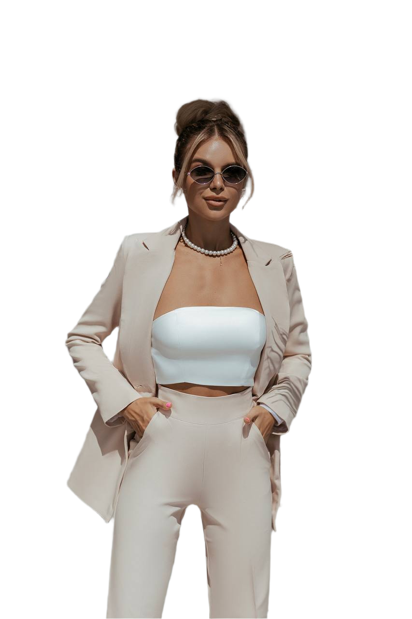 Woman wearing a beige suit with a white top on a white background