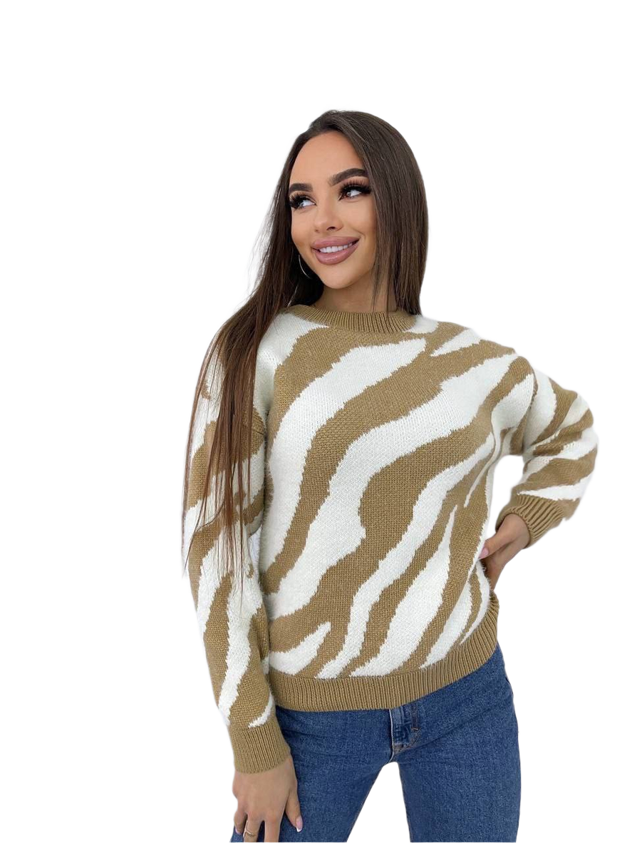 Woman wearing a zebra print sweater on a white background